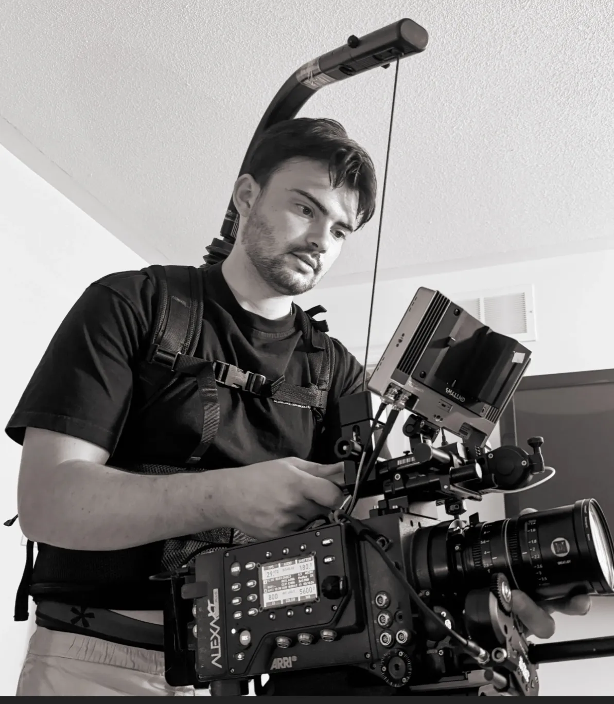 Nic Mongillo operating an ARRI cinema camera on a production.